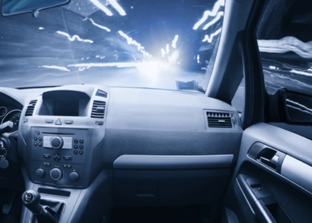 The passenger view of someone riding in a car