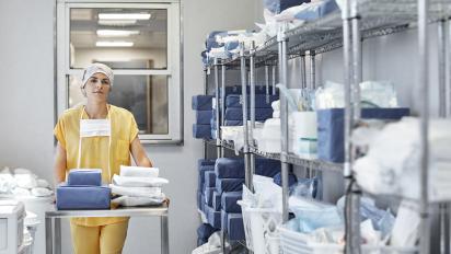 A hospital worker in medical storage