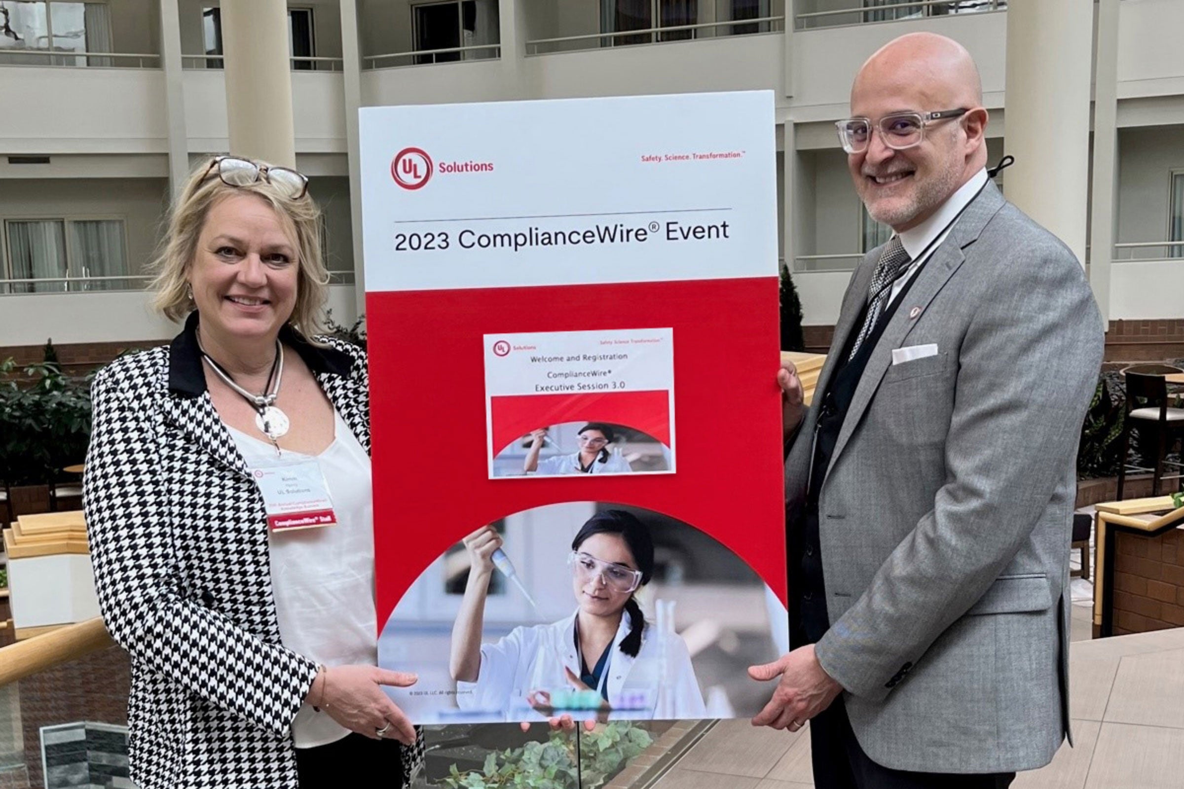 Kimm Henry, UL Solutions Demand Generation & Global Campaigns, with Kenneth Perez, UL Solutions ComplianceWire® event marketing team at the 20th Annual UL Solutions ComplianceWire® Knowledge Summit