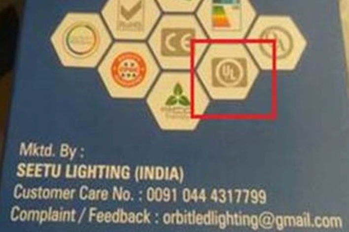 Unauthorized UL logo on lightbulb packaging up close