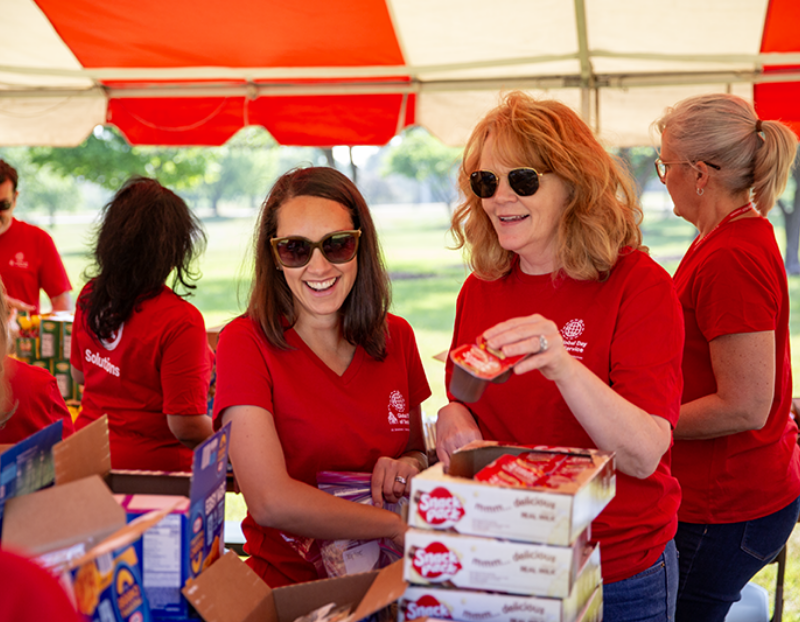 UL Solutions employees handing out food