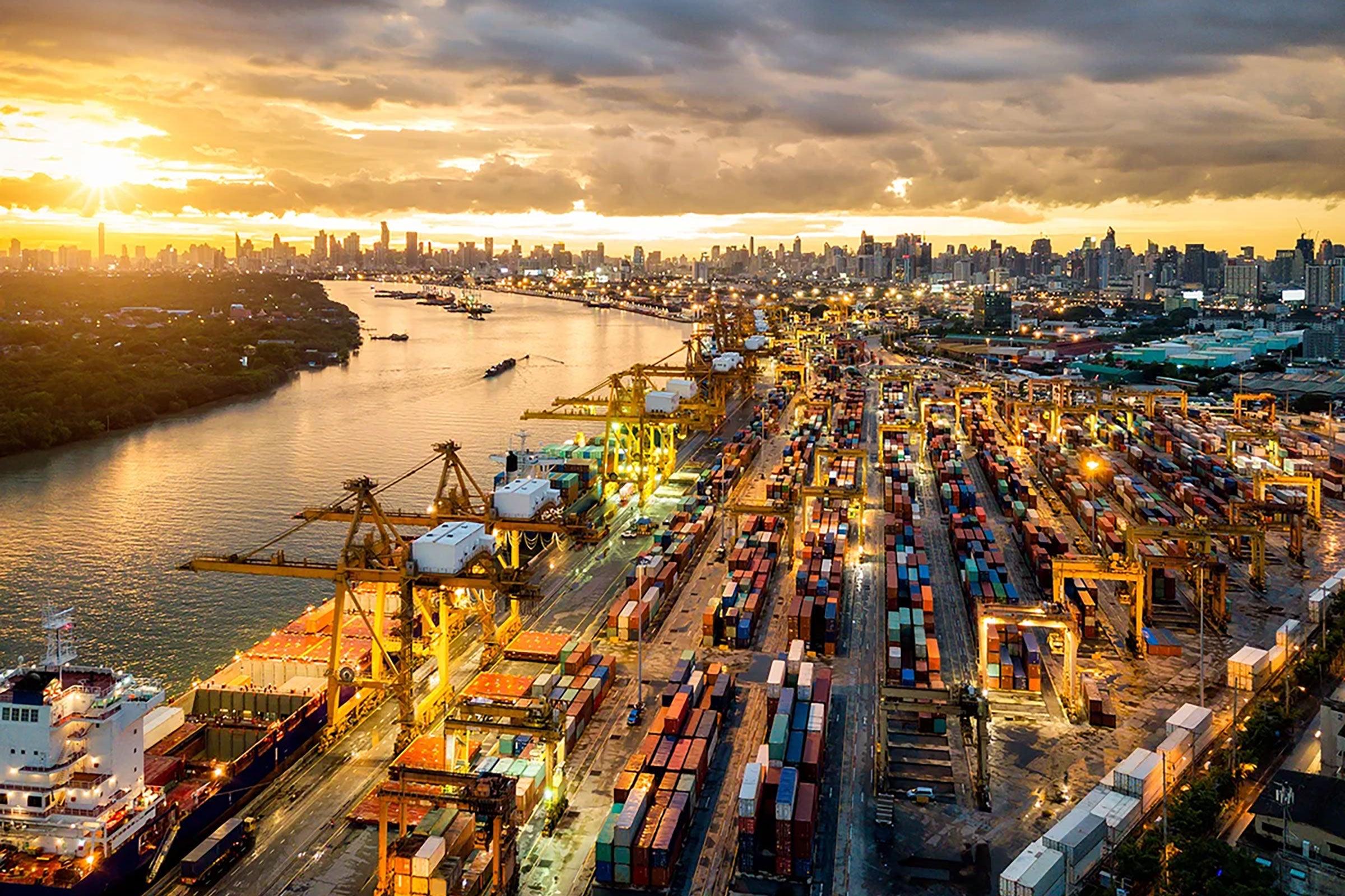 Aerial view of cranes loading shipping containers