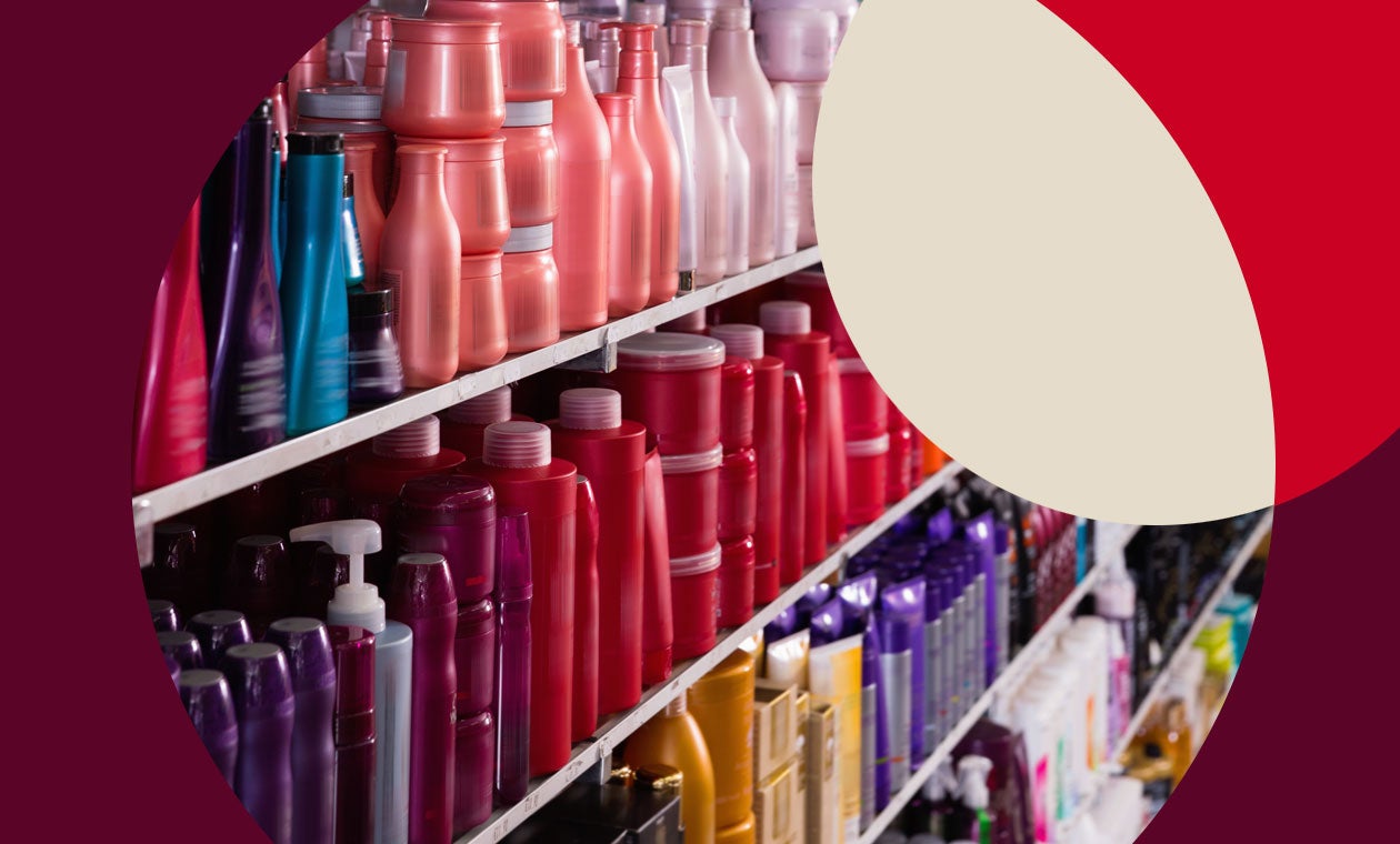 Personal care bottles lining shelves at a store