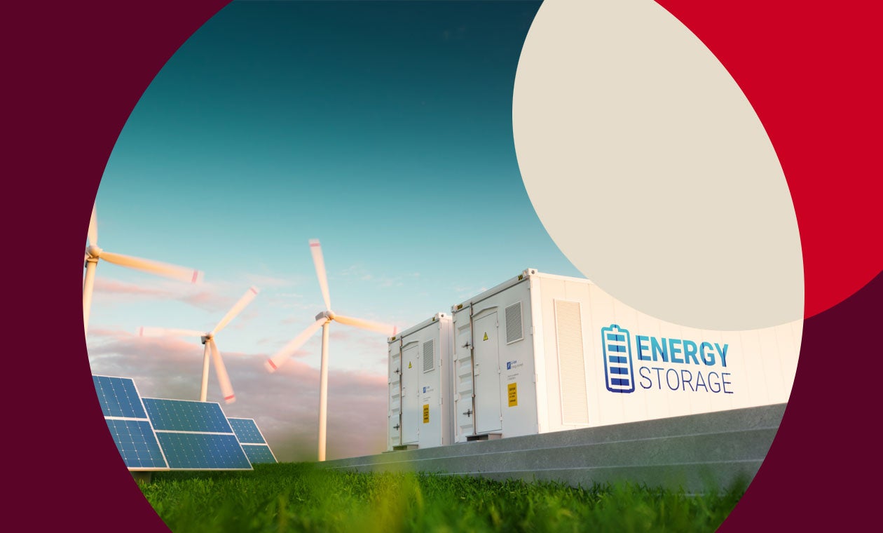 Energy storage power station next to a solar panels an wind turbines