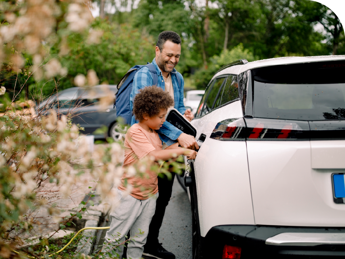 two people and an electric vehicle