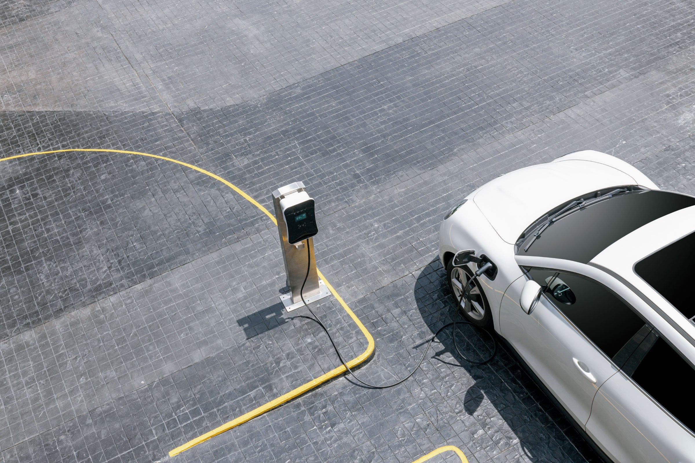 An electric vehicle at a charging station