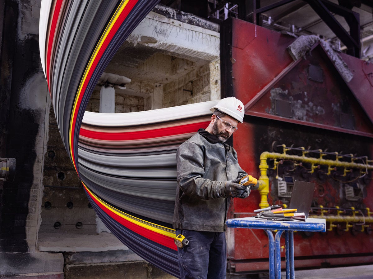 An engineer working on a steel test