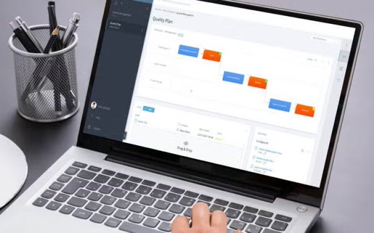 A person using Stages software on a laptop