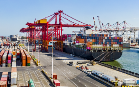 Elevated view of a container ship loading/unloading cargo