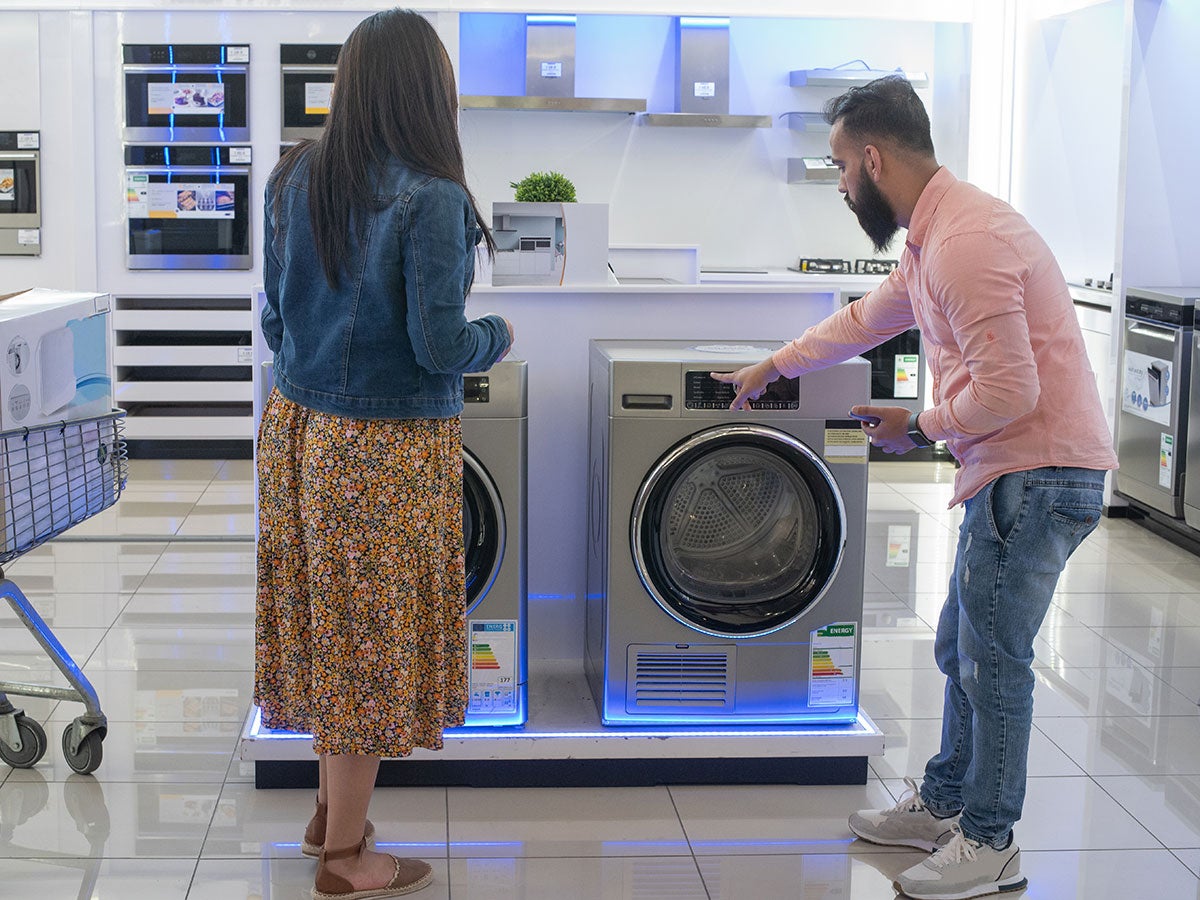 A couple shopping for a washer and dryer