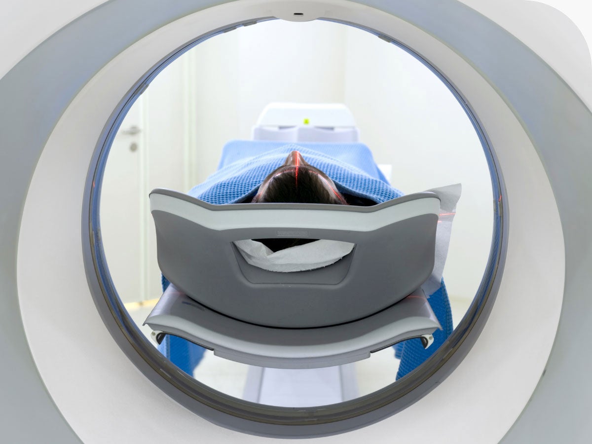 Rear view of a patient receiving an MRI