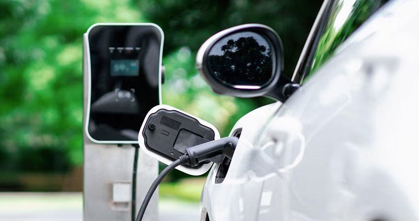 An electric vehicle at a charging station