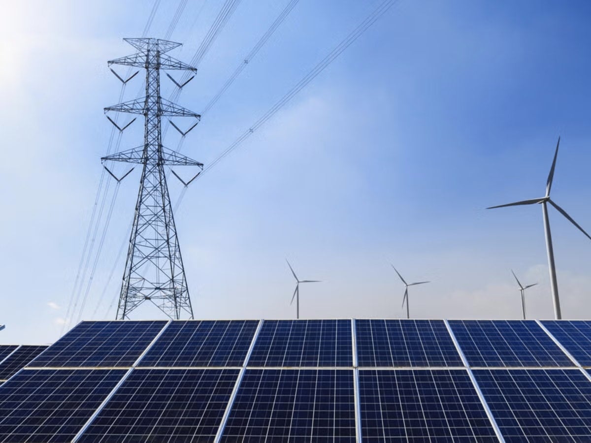 solar panels and electricity pylon