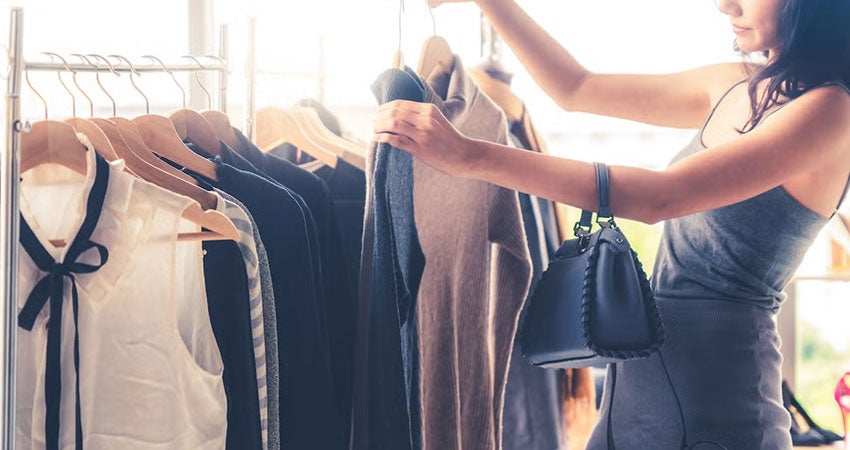 A person looking at clothing