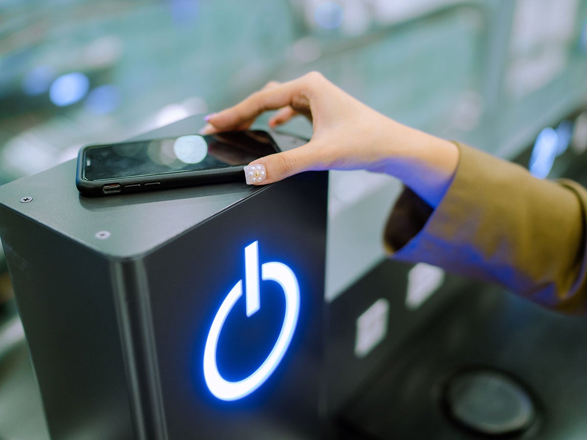 A person using an app for another device