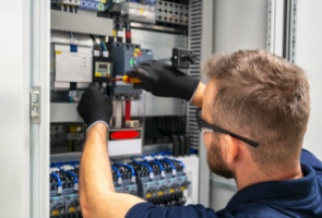 A person working with gloves on