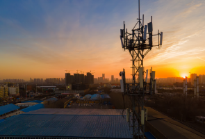 A cellphone tower at sunset