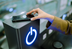 A person using a mobile app to turn on another device