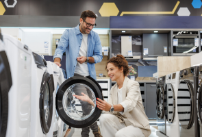 Two people enjoying their time picking out a new dryer