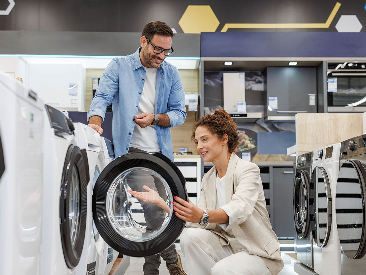 Two people enjoying looking for a dryer