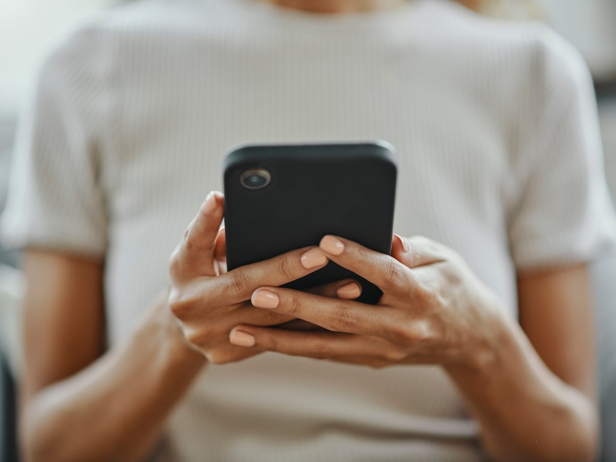Closeup of a person using their mobile phone