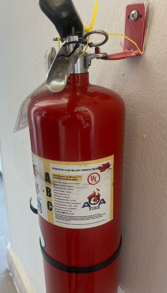 AA Fire Dry Chemical Fire Extinguisher that bears an unauthorized UL Certification Mark.