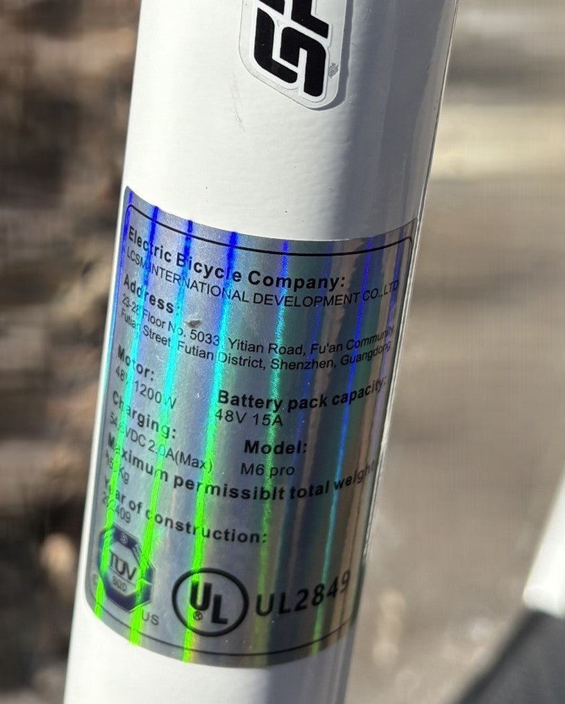 Close-up of unauthorized UL label on electric scooter Model M6 Pro