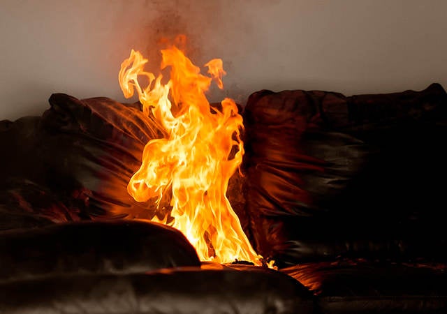 Flame testing on a couch.