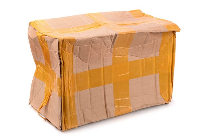 A beaten-up cardboard box. 