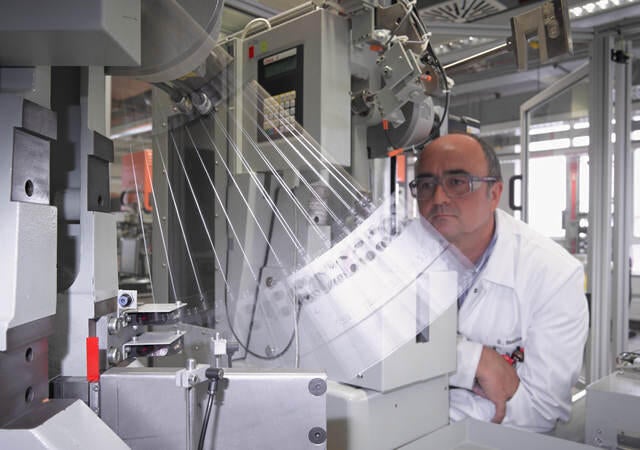 Lab tech conducting impact test