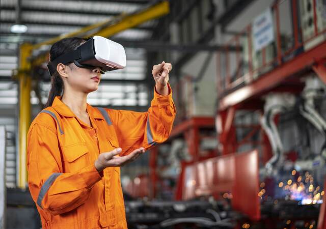 Engineer puts VR in a factory.