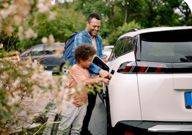 two people and an electric vehicle