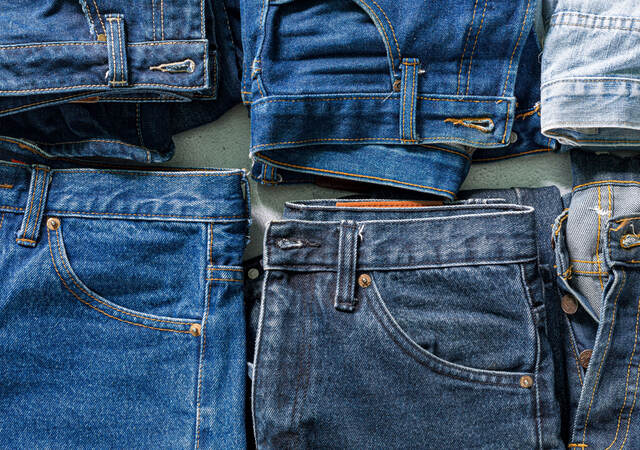 Several pairs of folded jeans