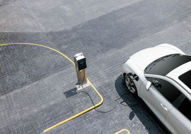 An electric vehicle at a charging station