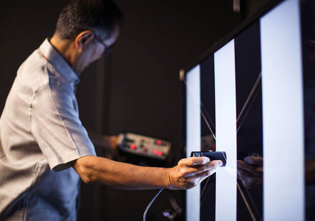 A person testing energy efficiency