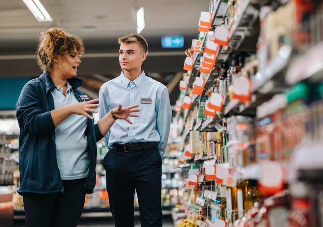 female grocery store supervisor training male new hire