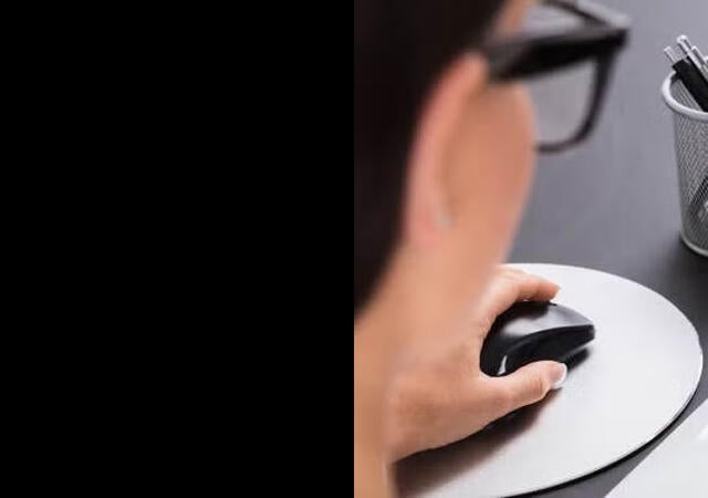 person using Stages software on a laptop