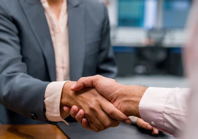 Two people shaking hands