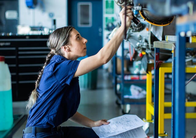 Mechanic double checking a machine