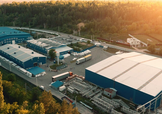 Overhead view of a factory at sunrise