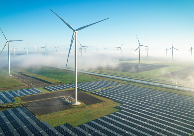 landscape with windmills and solar panels