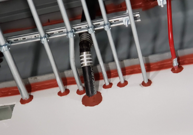 Fire Resistance-Rated Walls Adjoining Unprotected Steel Beams