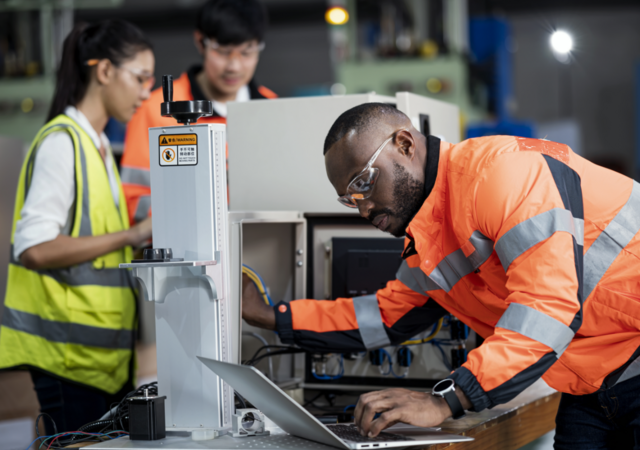 people wearing safety gear and working