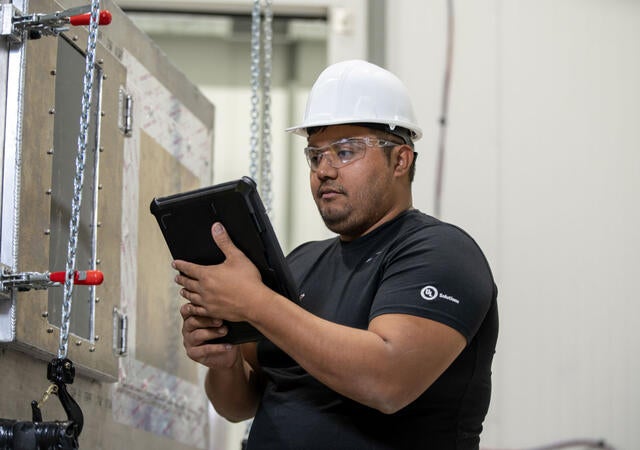 A UL Solutions employee testing an HVAC system