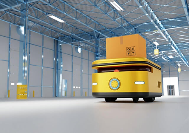 A large yellow automated robot