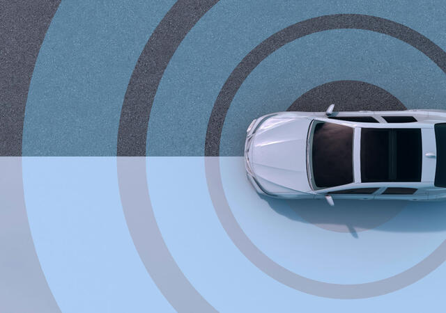 An overhead view of a white automobile