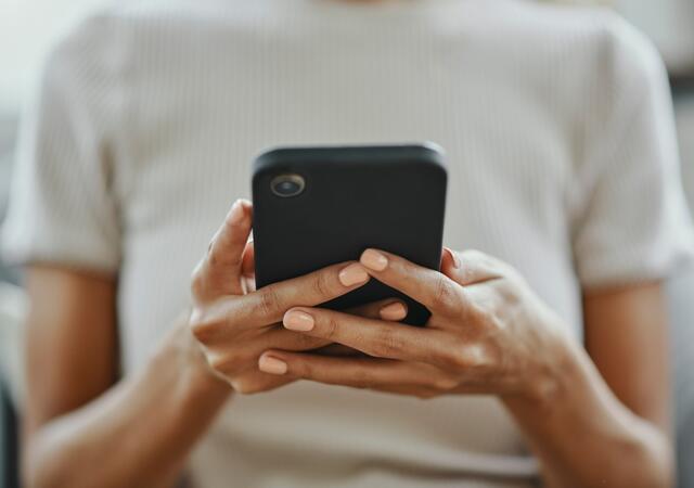 Closeup of a person using their mobile phone