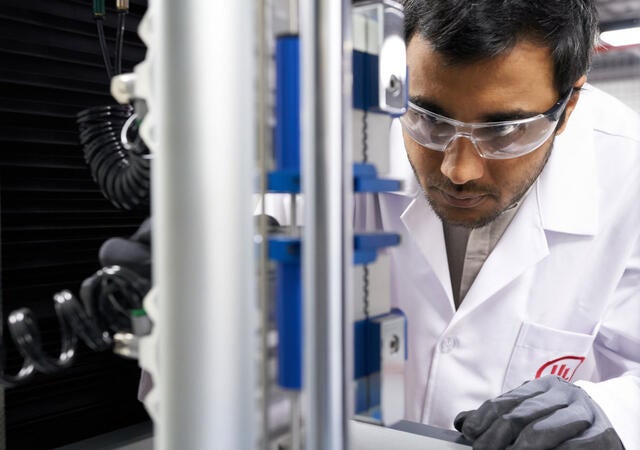 UL Solutions lab tech conducting tests