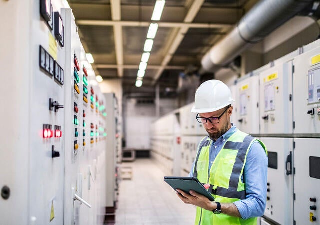 A person working in a data center
