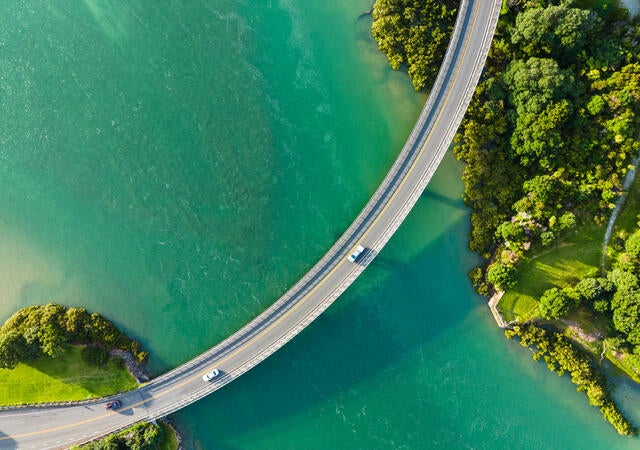 car driving on bridge over water